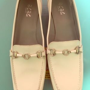Super unique BCBG White leather loafer.